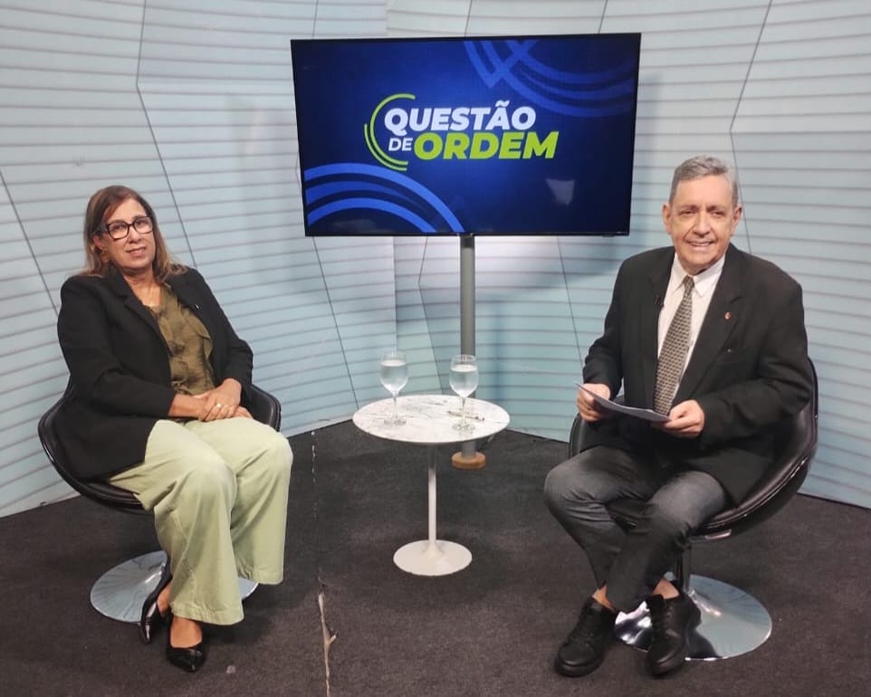 Professora Cláudia do Ó Pessoa e jornalista Renato Abreu